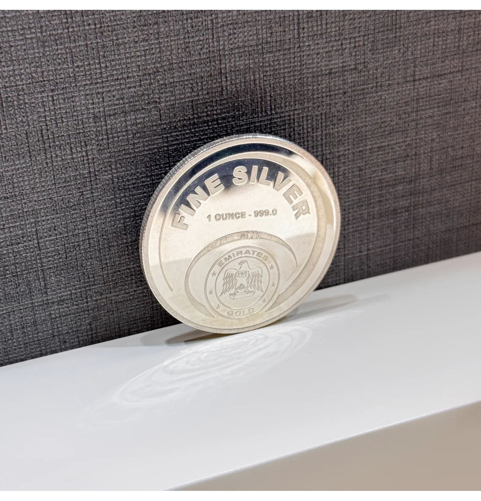 Silver coin weighting one ounce 999 purity