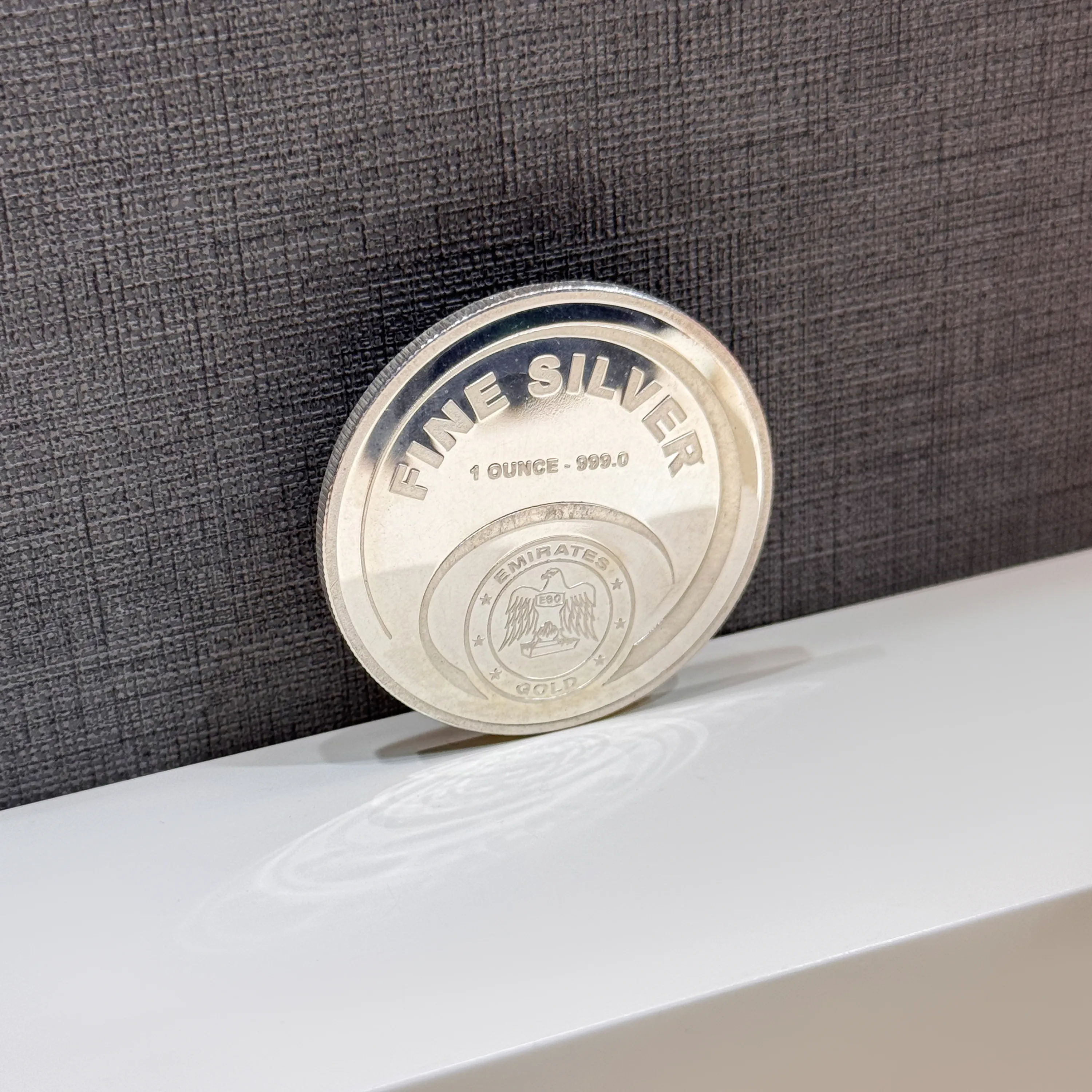 Silver coin weighting one ounce 999 purity