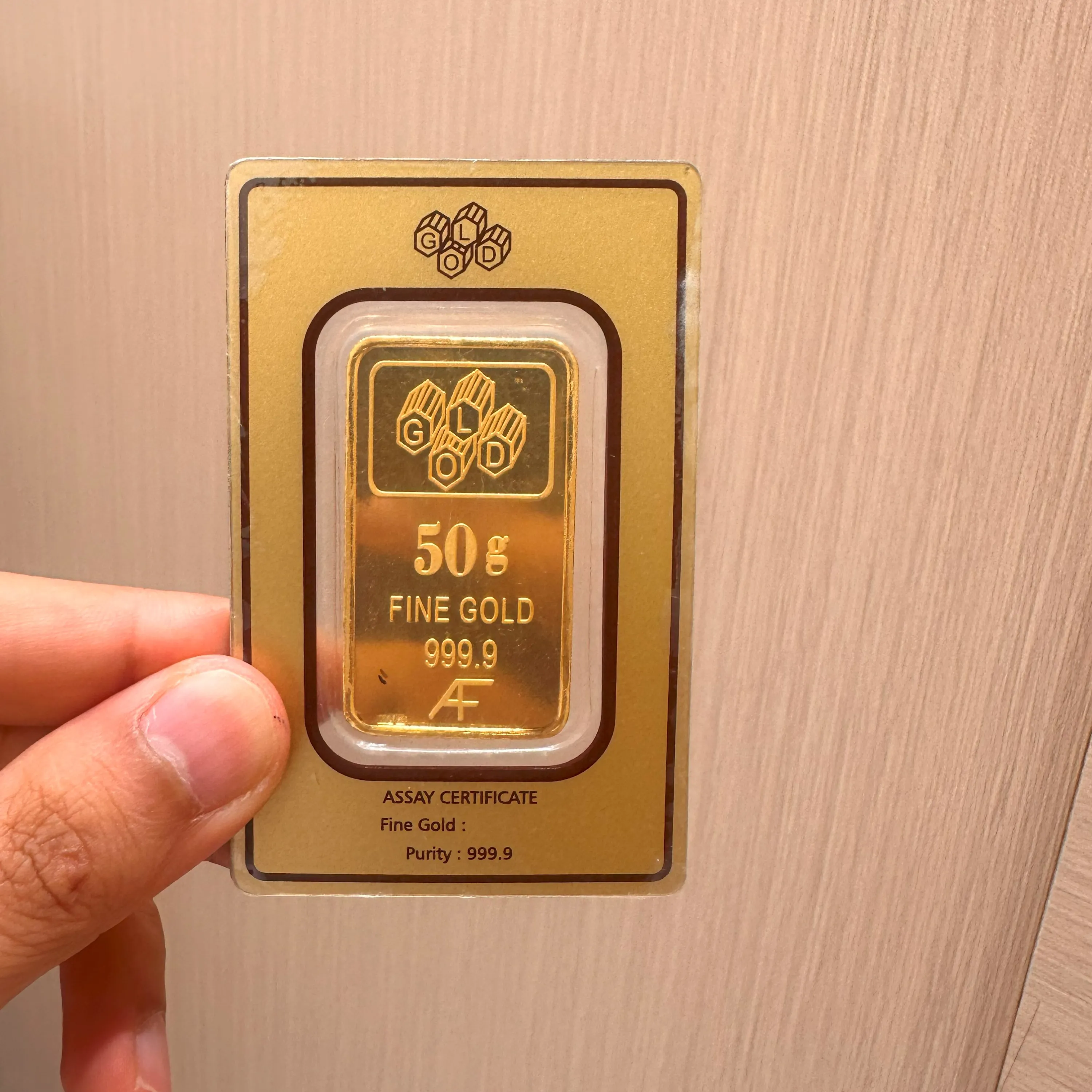 50 grams 24 karat (9999) gold bar - only purchase by whatsapp 97111978