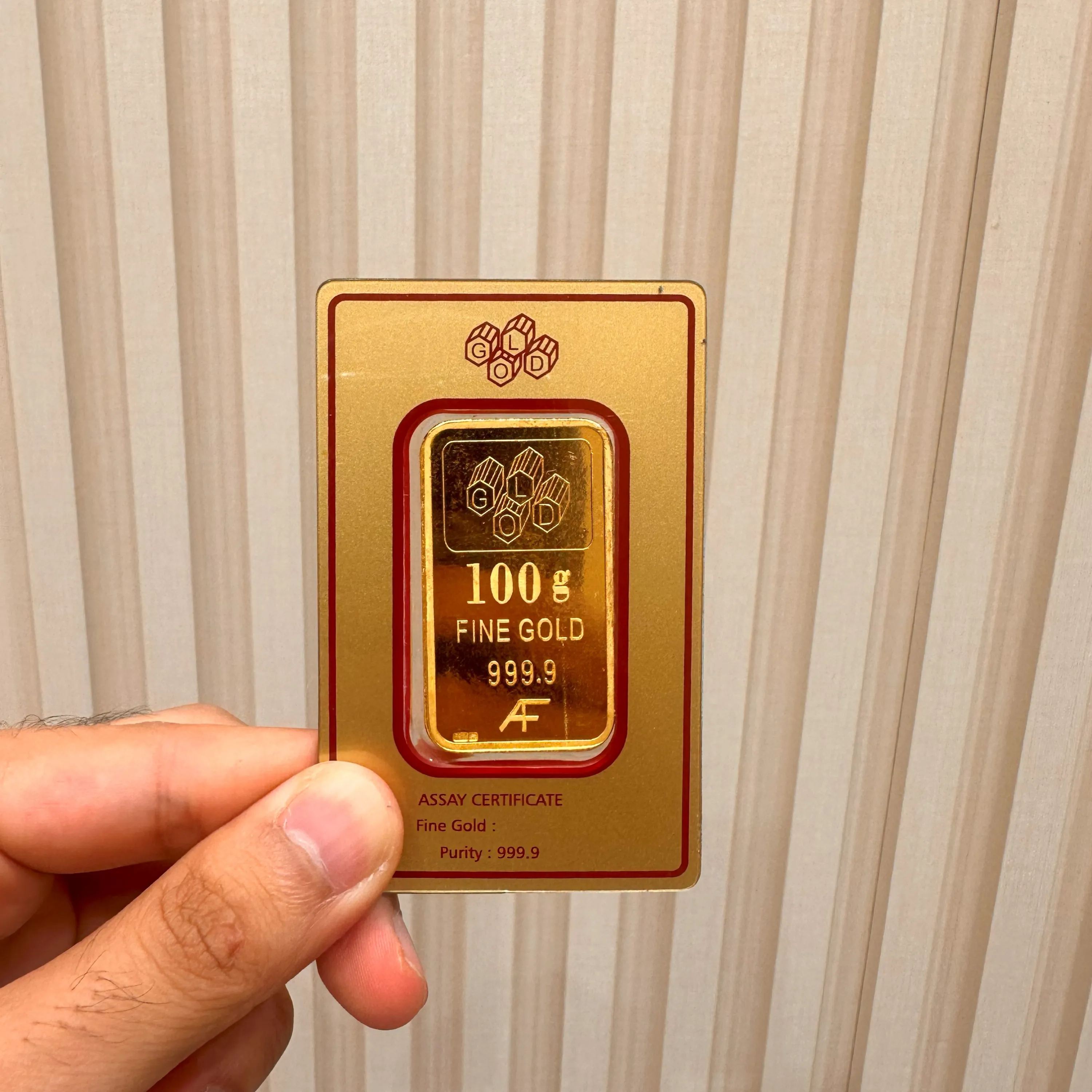 100 grams 24 karat (9999) gold bar - only purchase by whatsapp 97111978