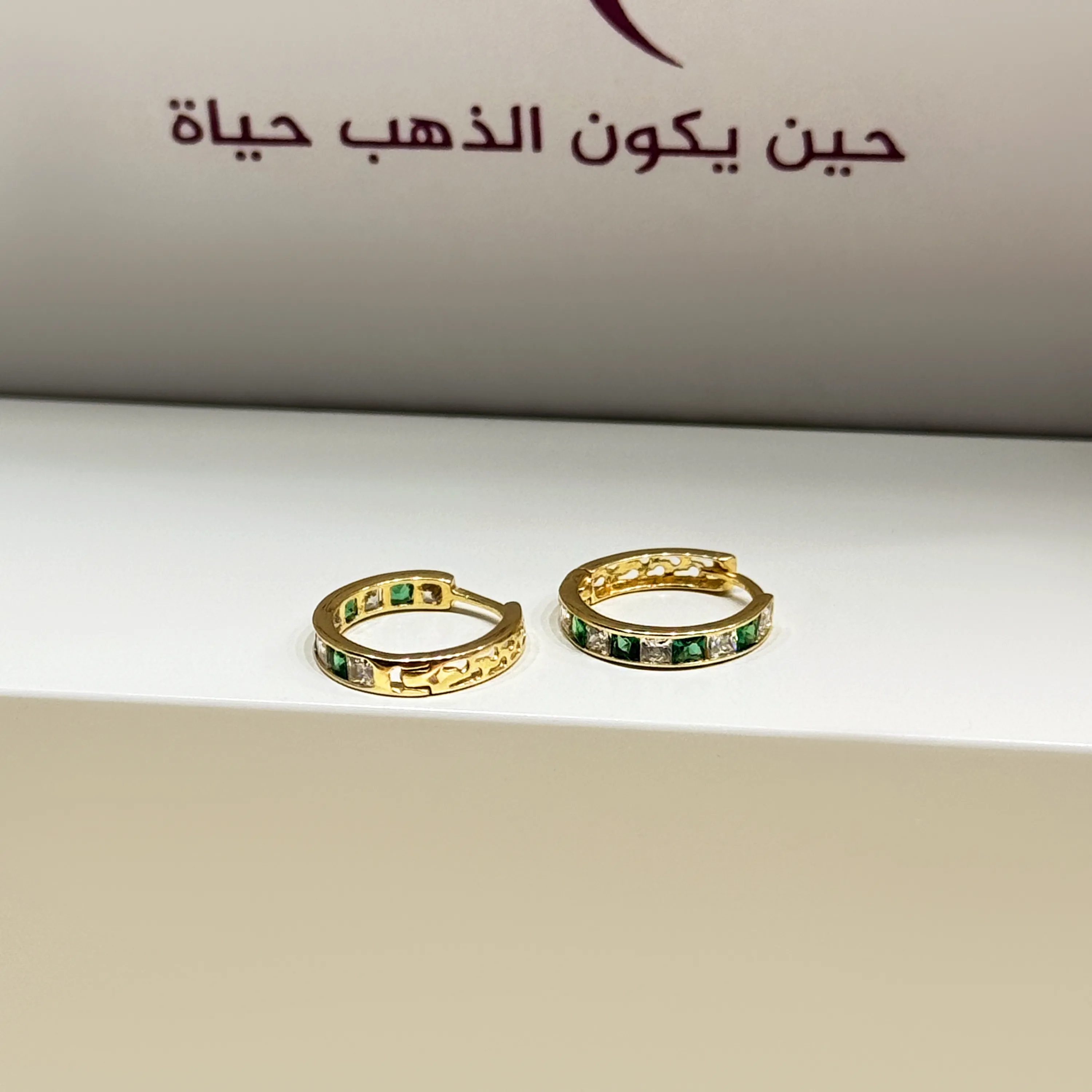 18-karat gold crescent hoop earrings, made in Turkey