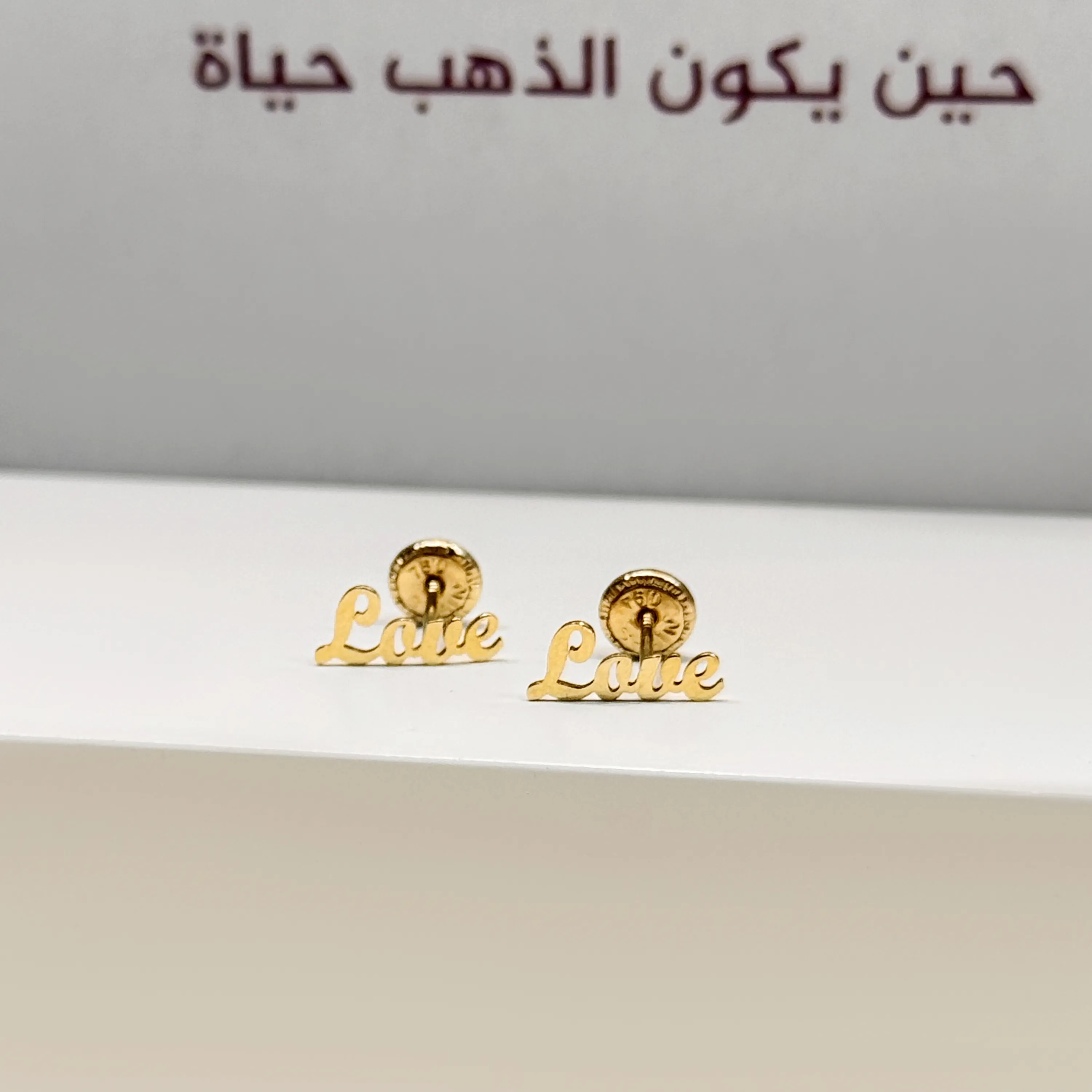 18-karat gold earrings, Italian made