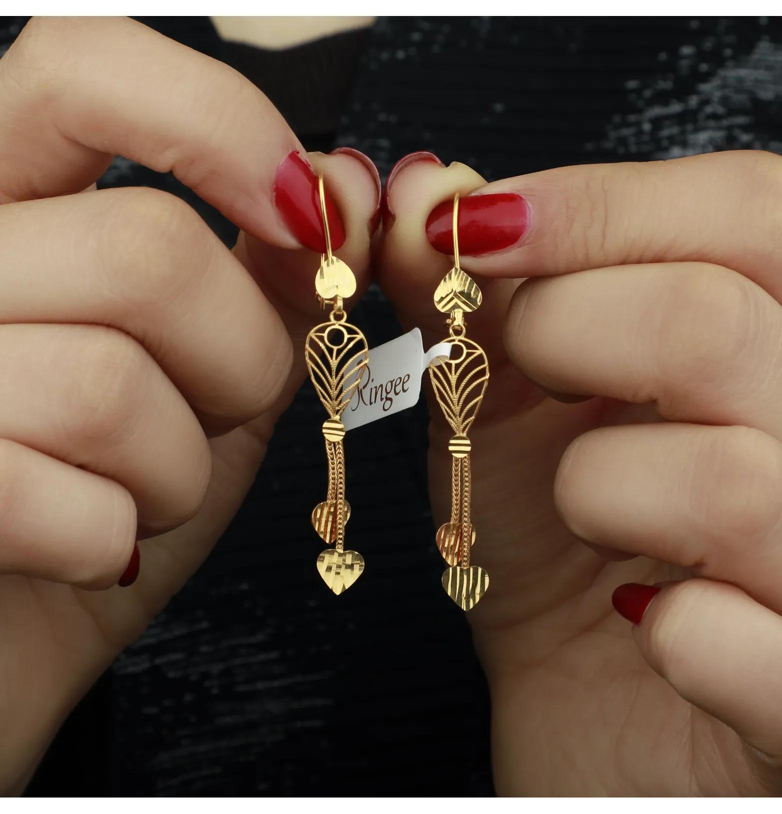 21-karat gold earrings, made in Kuwait