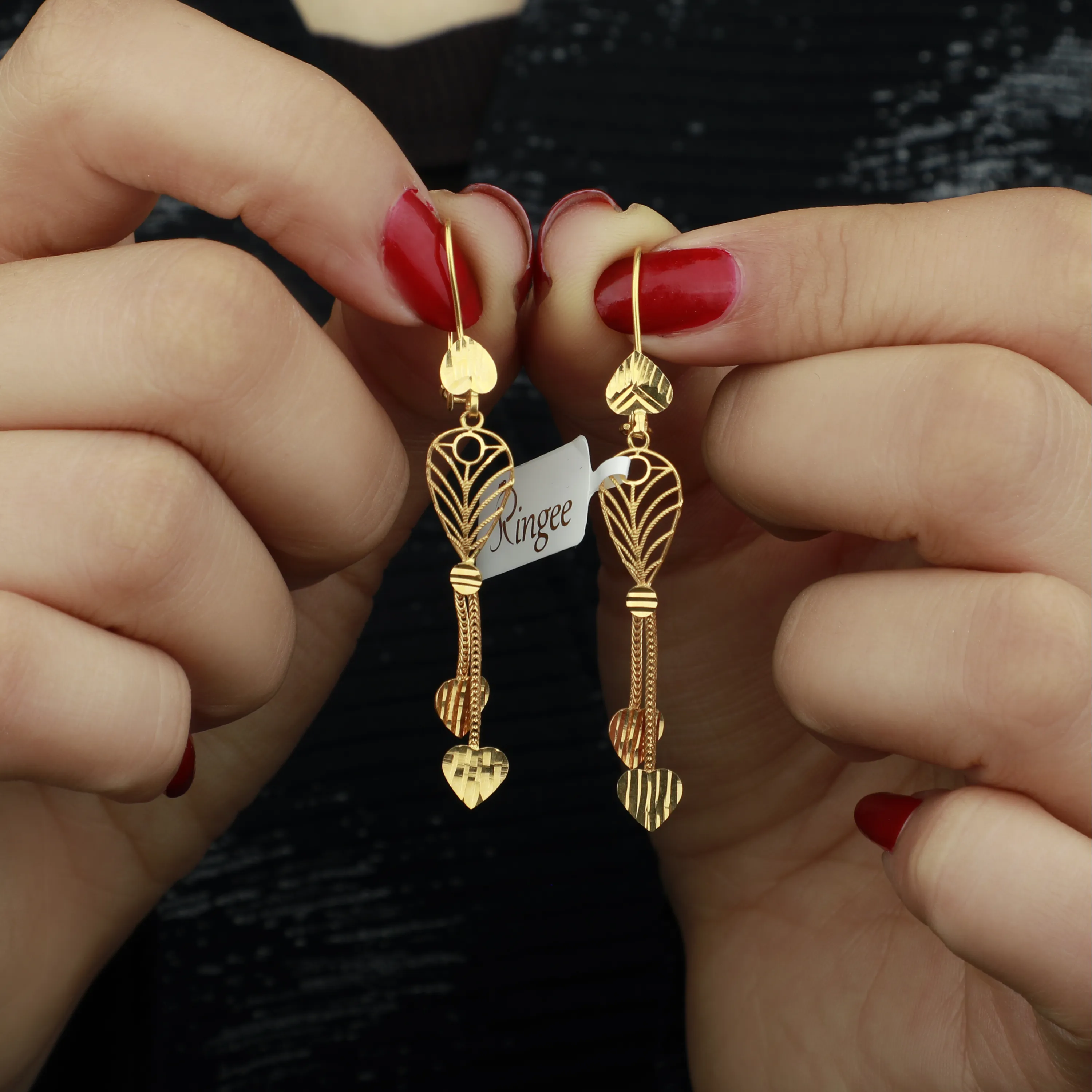 21-karat gold earrings, made in Kuwait
