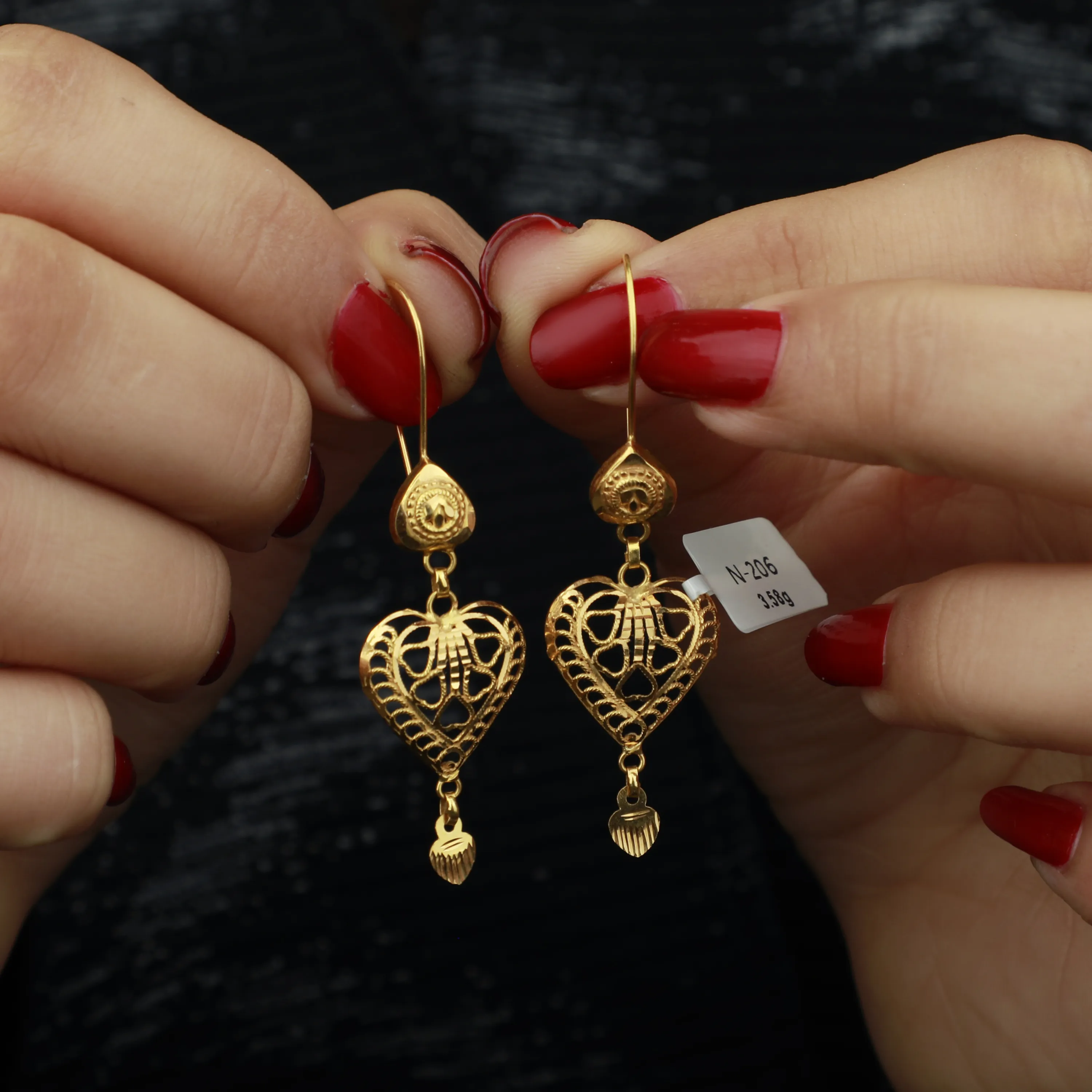 21-karat gold earrings, Omani made