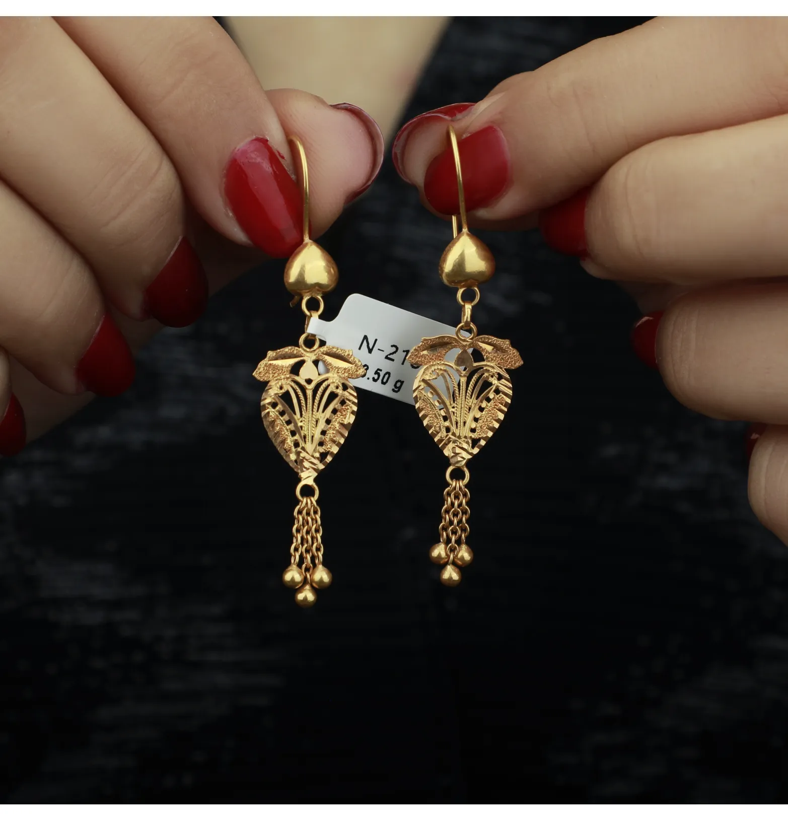 21-karat gold pendant earrings, Omani made