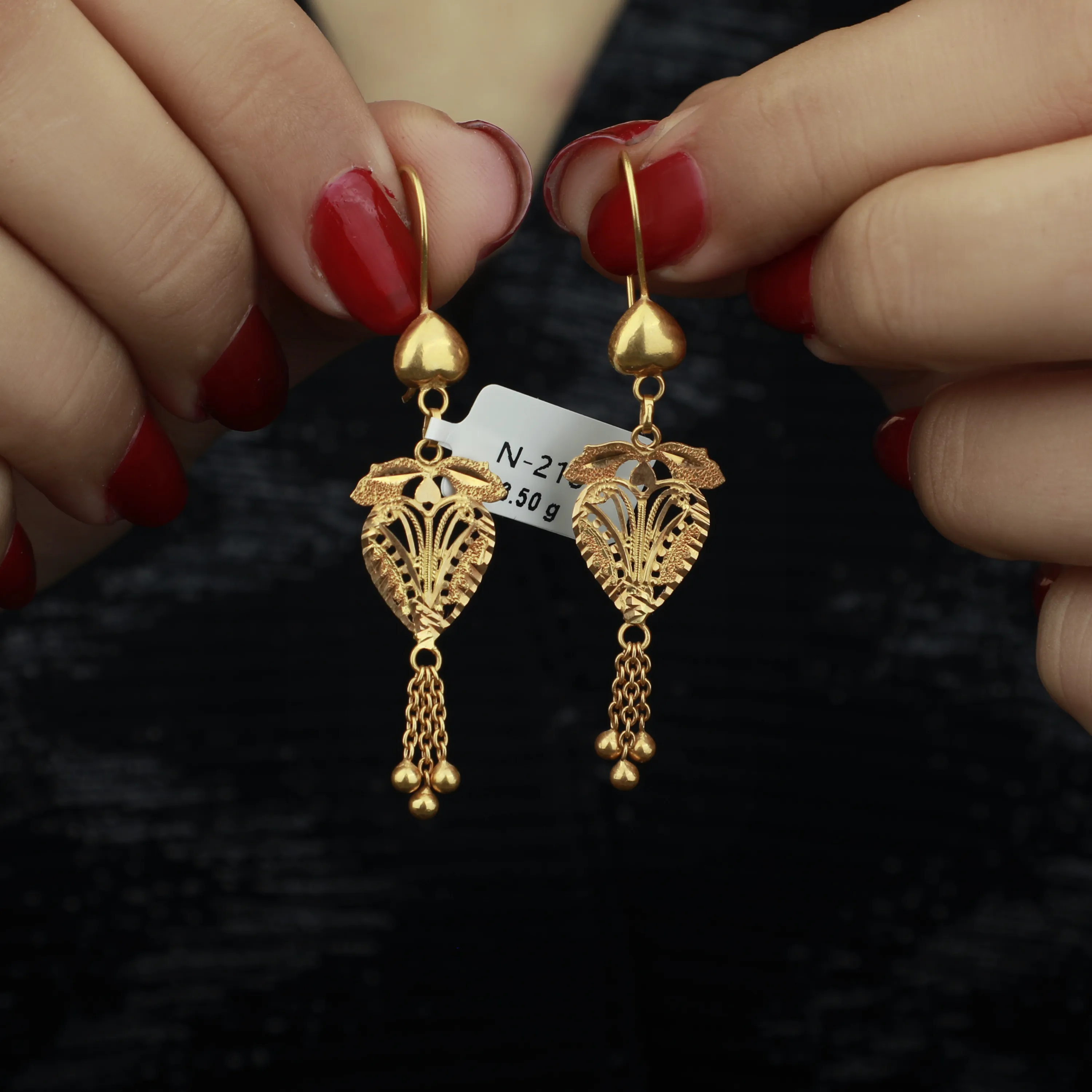 21-karat gold pendant earrings, Omani made