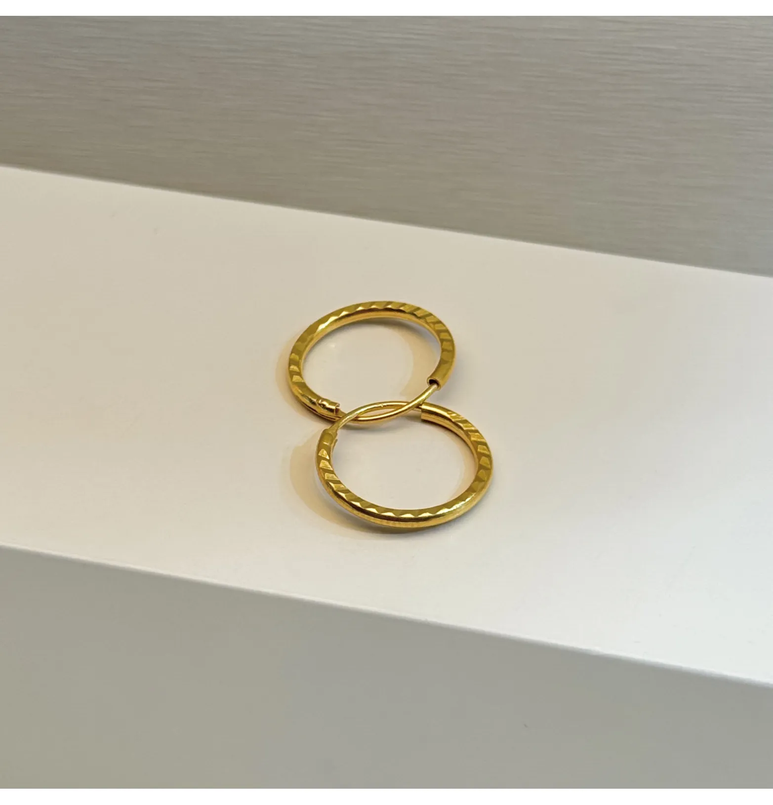 21-karat gold hoop earrings for children, Omani-made