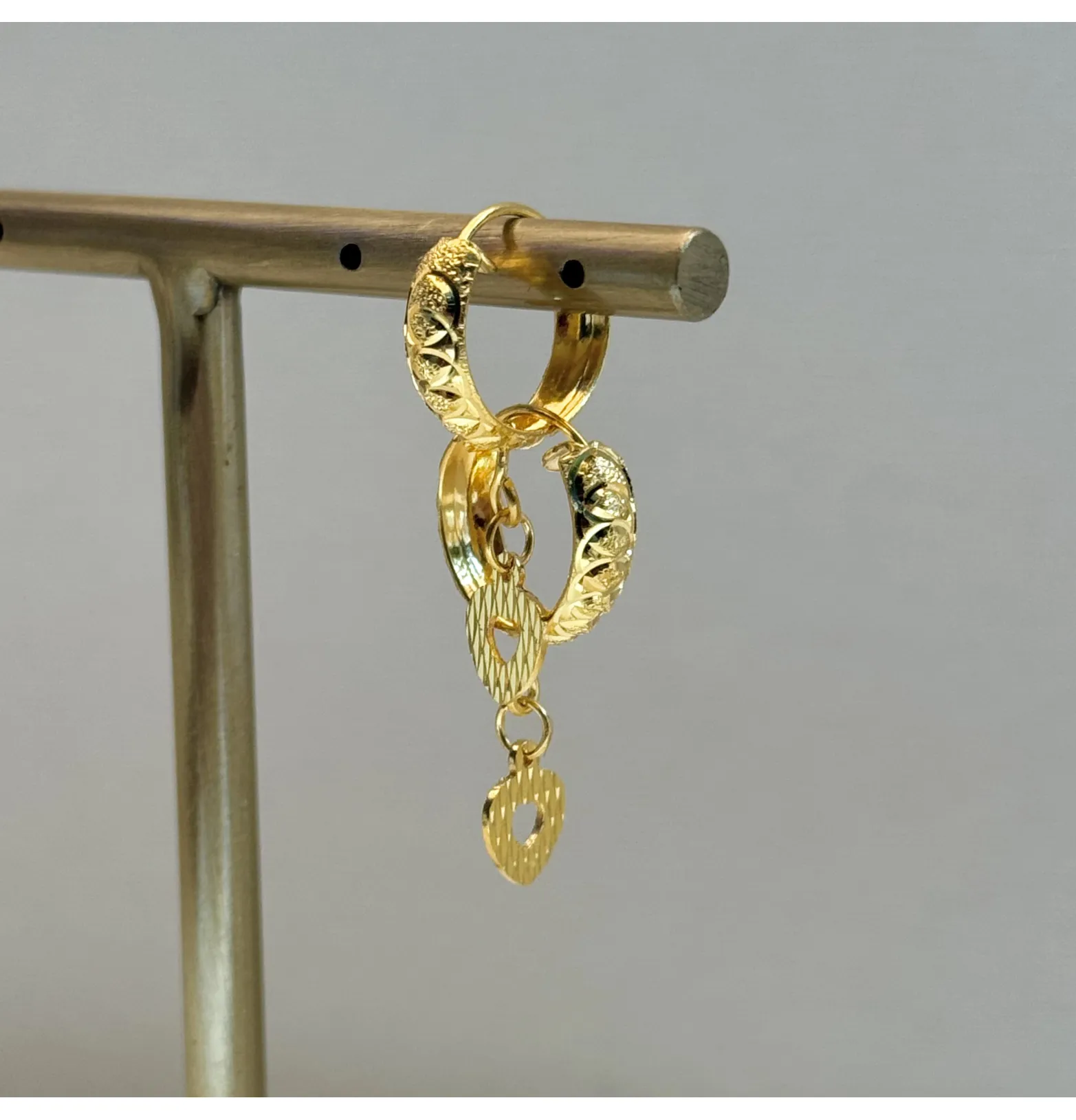 21-karat gold hoop earrings, made in the UAE
