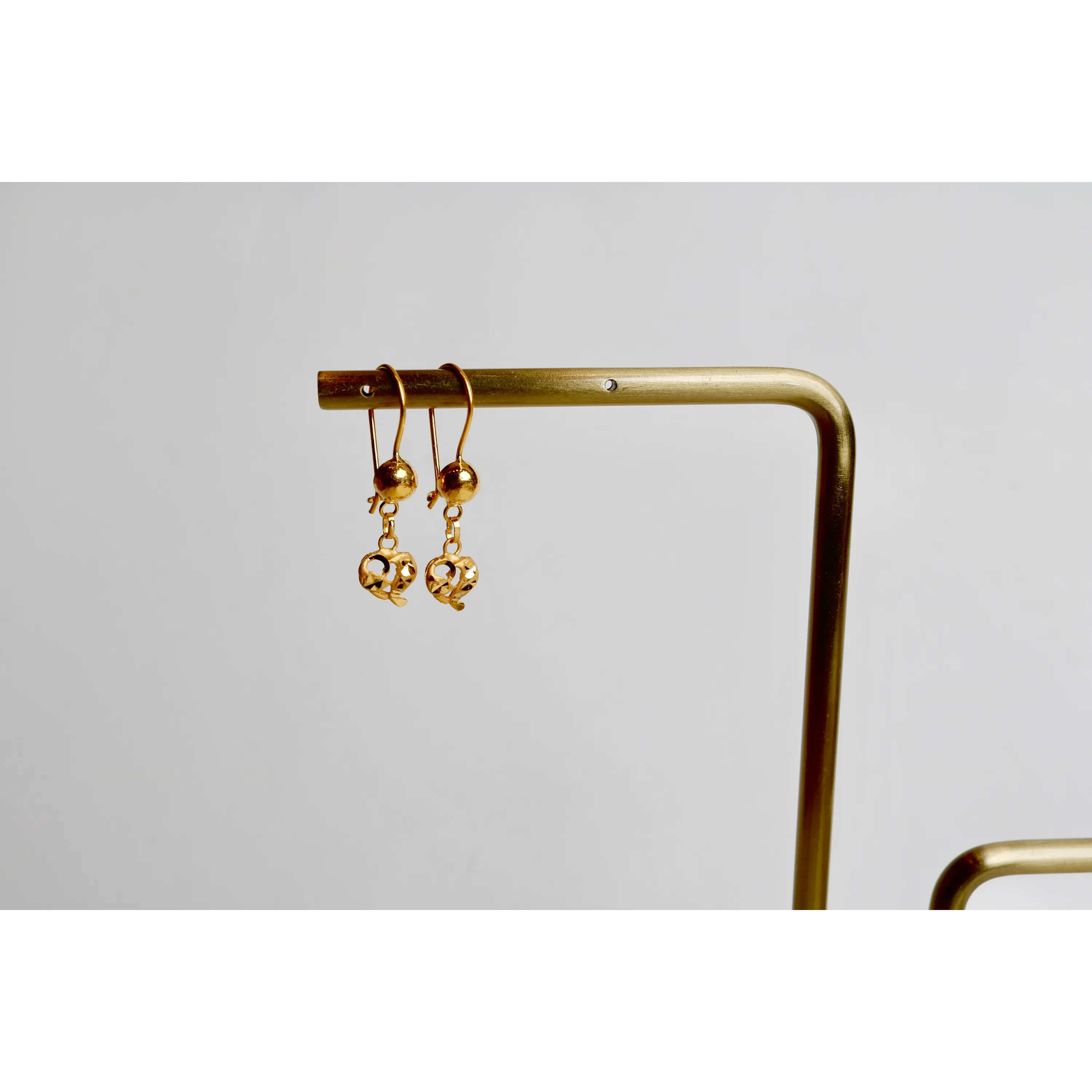 21-karat gold pendant earrings, Omani made