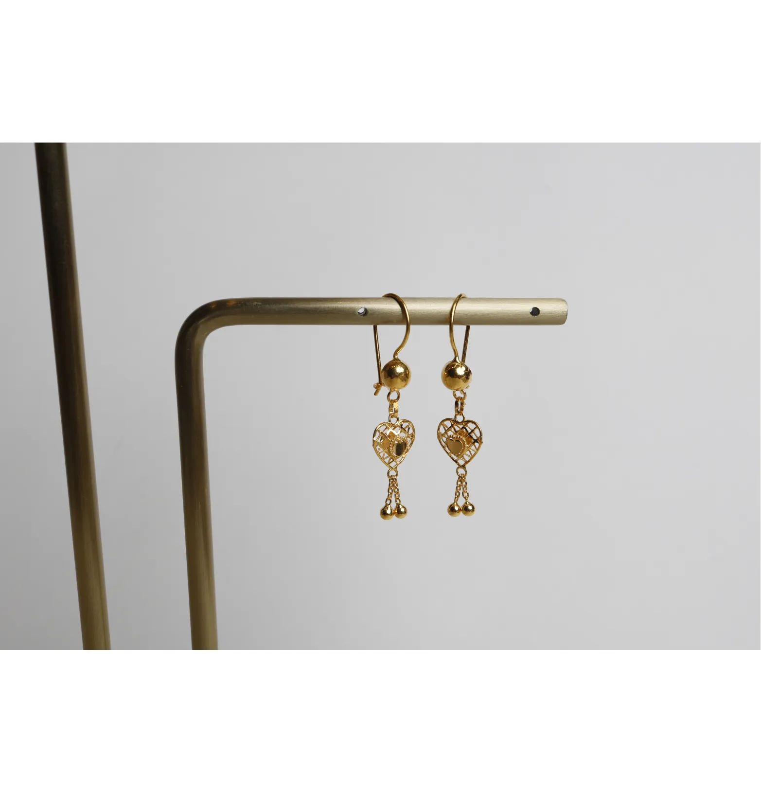 21-karat gold pendant earrings, Omani made