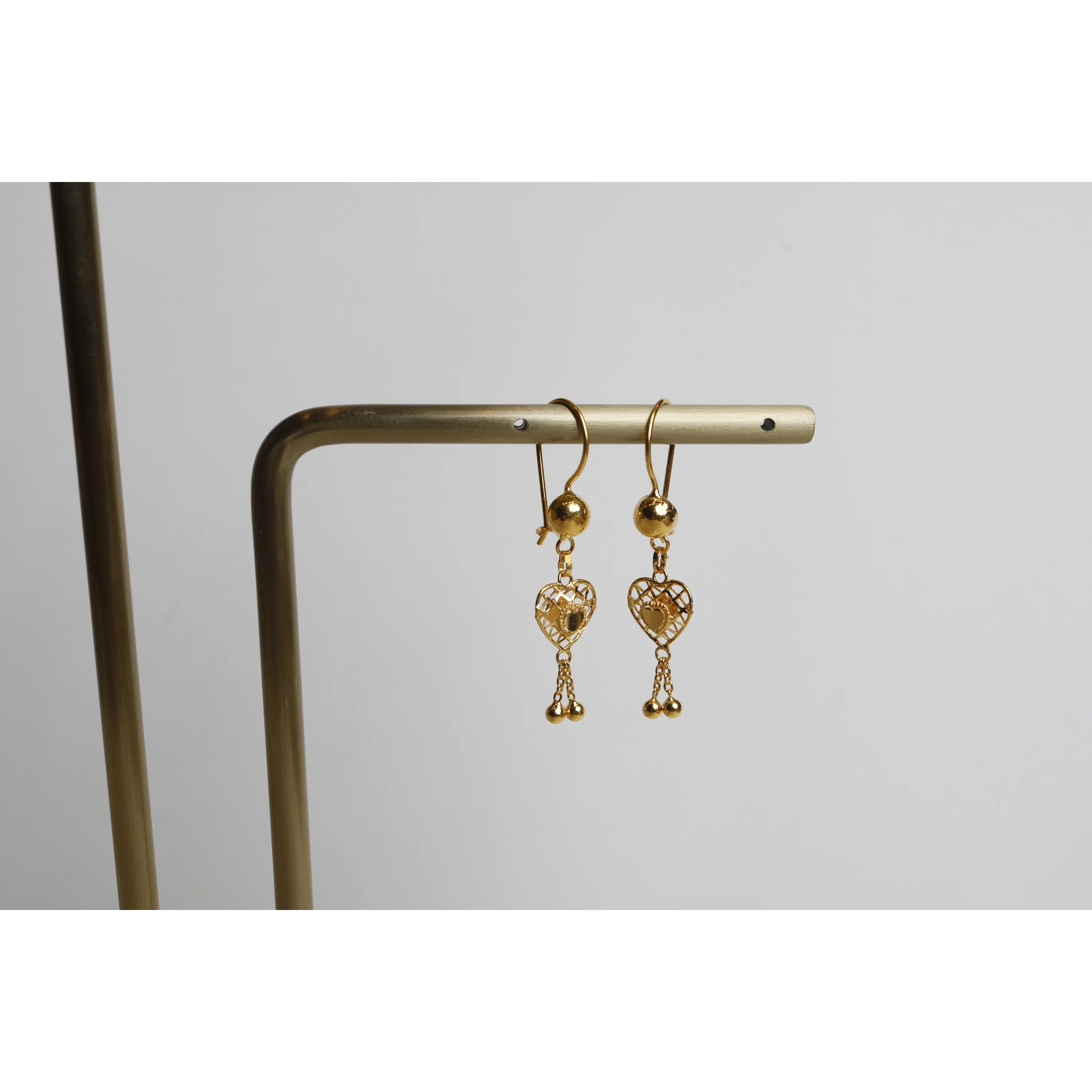 21-karat gold pendant earrings, Omani made