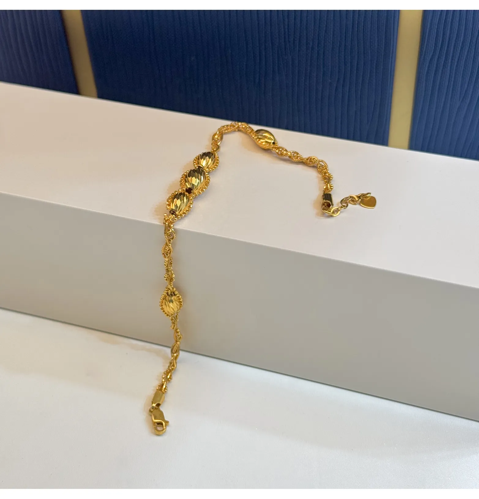 21 karat gold bracelet, made in Singapore