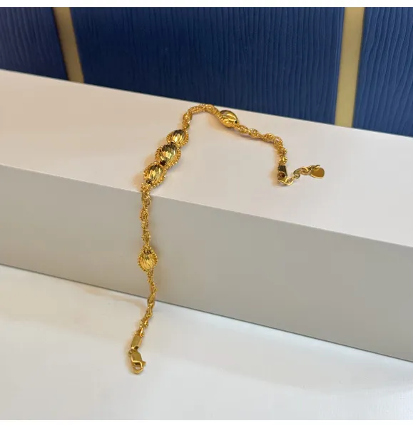 21 karat gold bracelet, made in Singapore