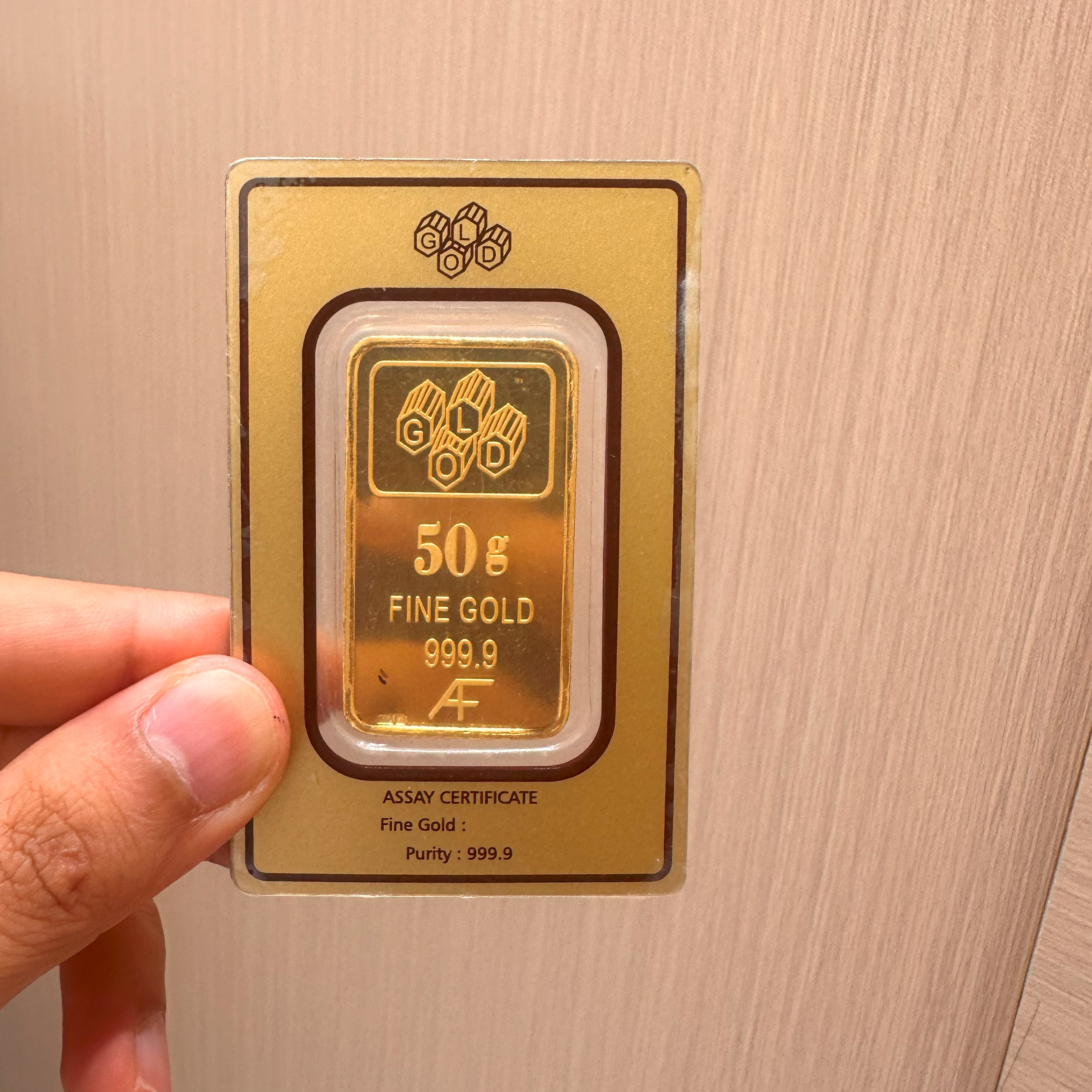 50 grams 24 karat (9999) gold bar - only purchase by whatsapp 97111978 - (G-0006)