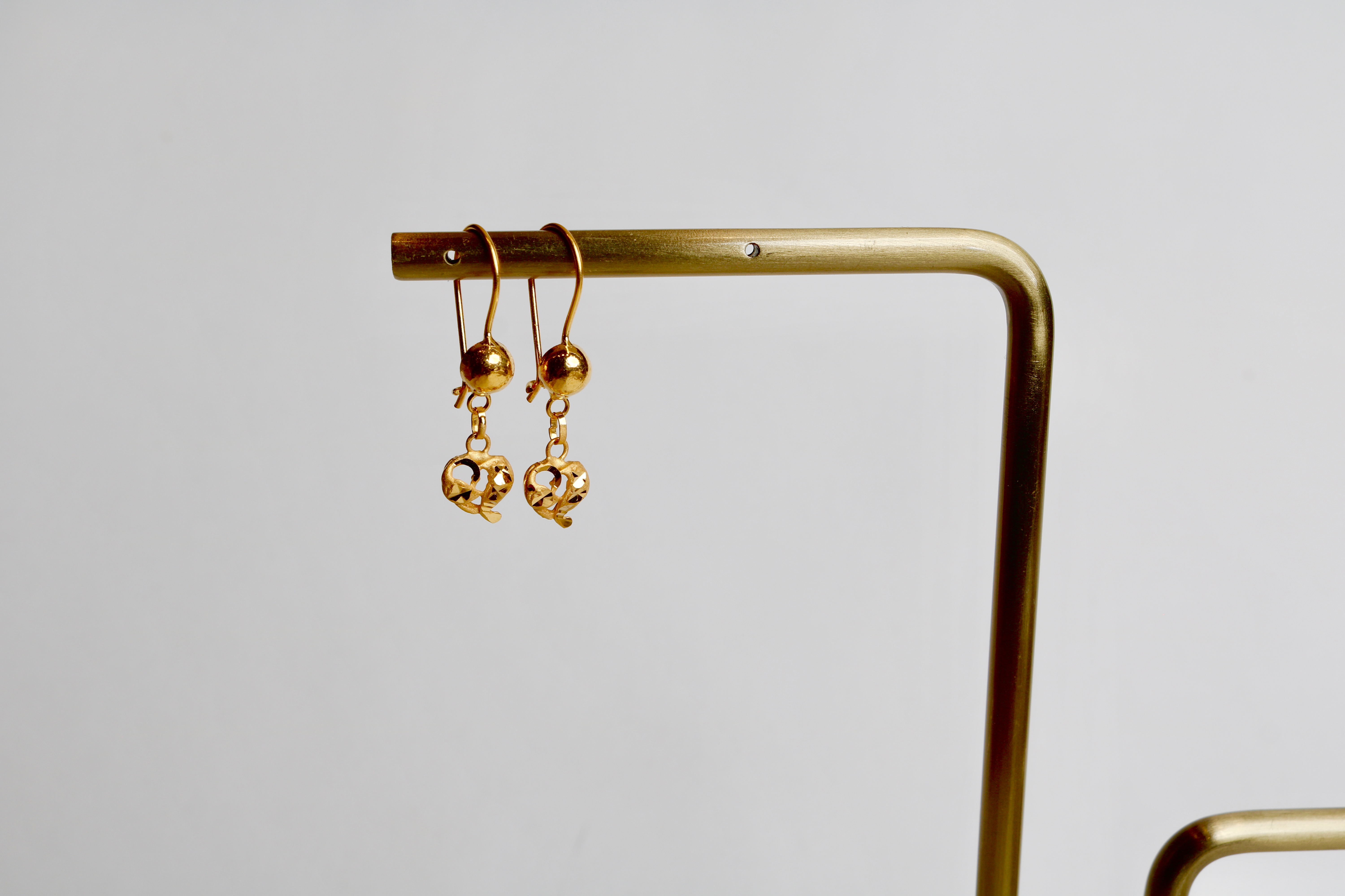 21-karat gold pendant earrings, Omani made