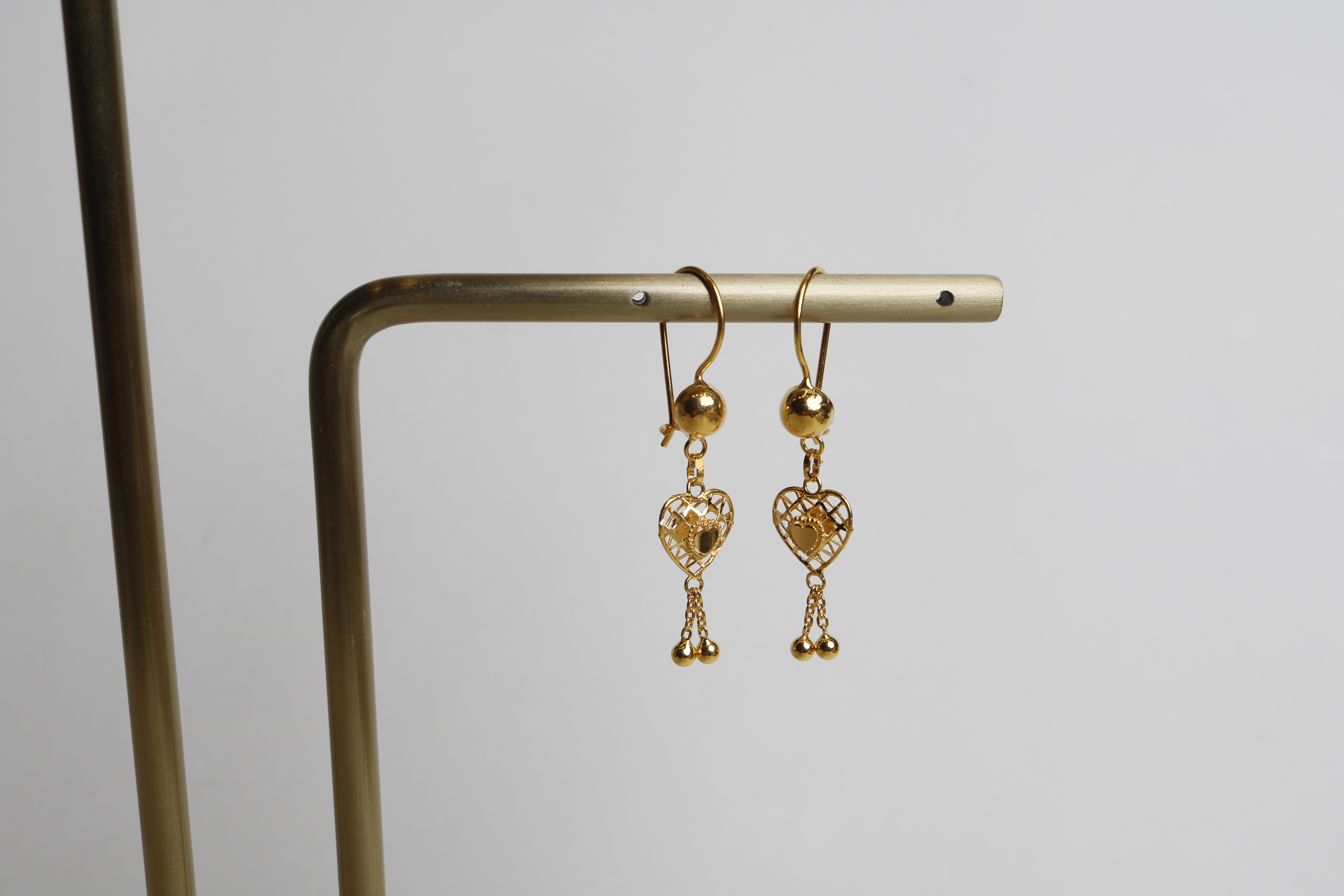 21-karat gold pendant earrings, Omani made